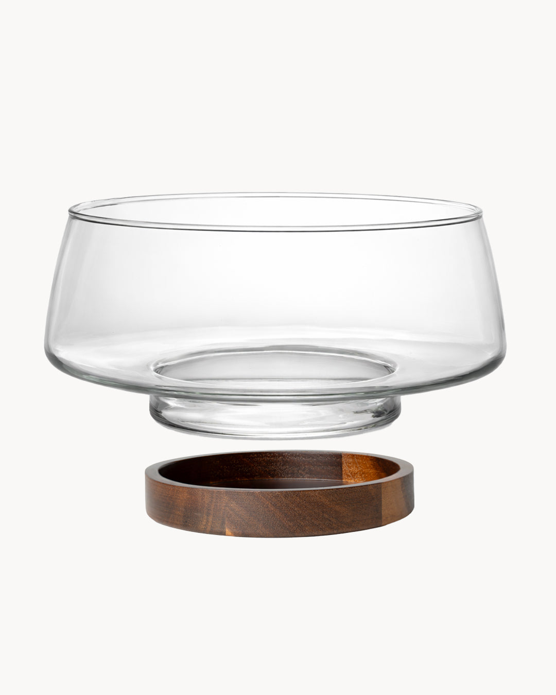 Salatschüssel aus Glas mit Salatbesteck und Untersetzer